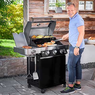Man grilling on the Videro G3-S.