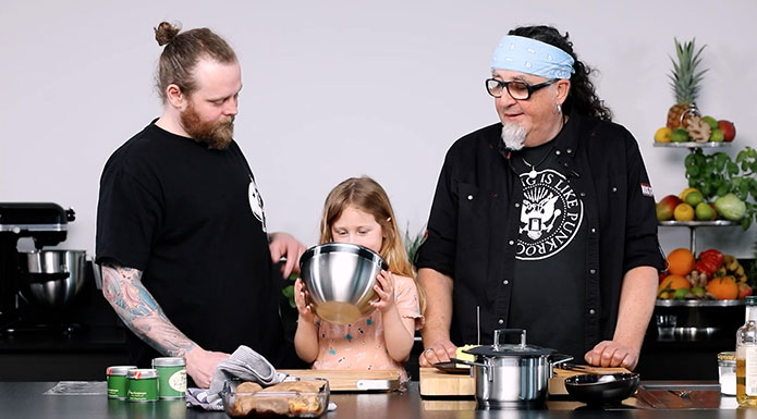 Stefan Marquard cooks with child 