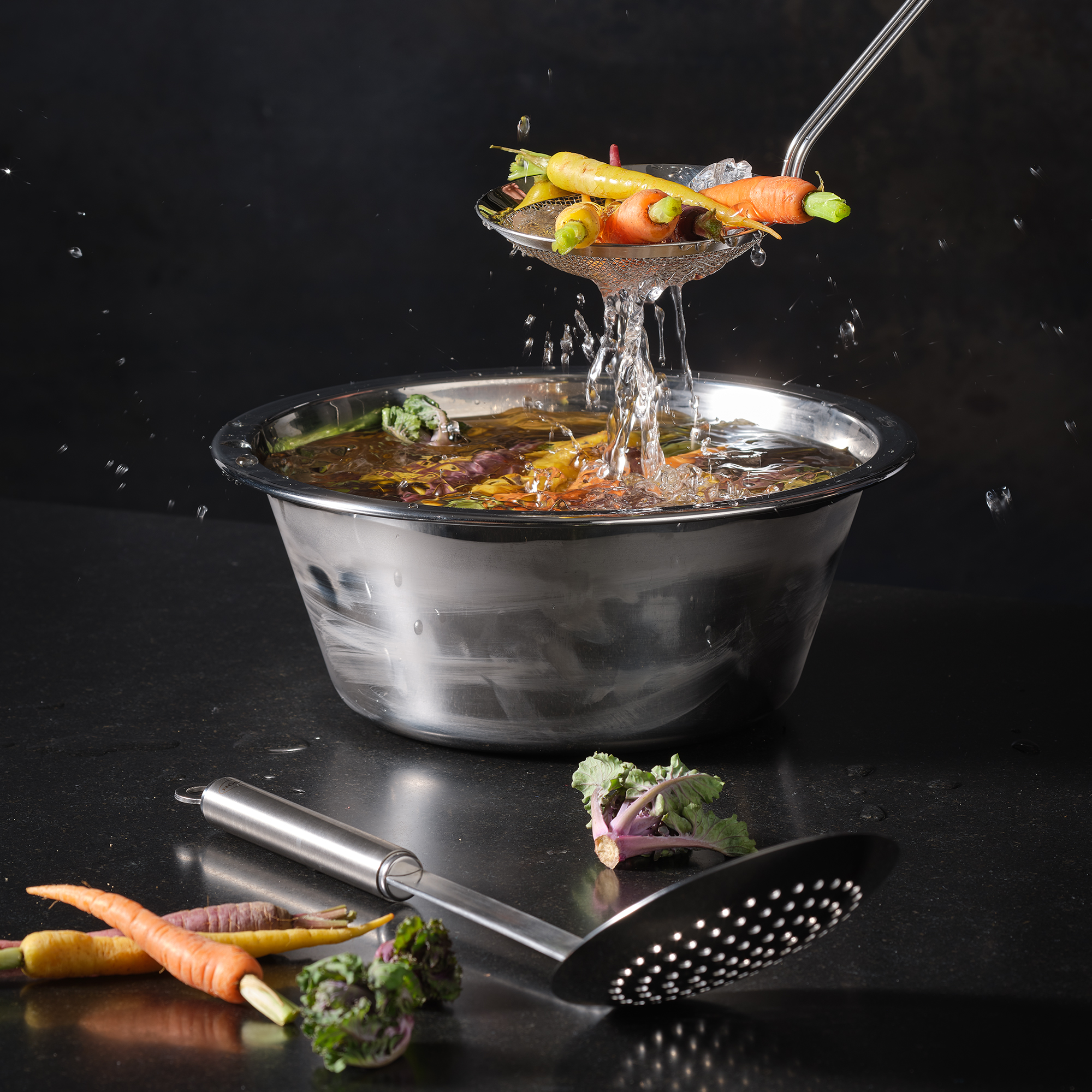 RÖSLE slotted spoon with round handle Stainless steel slotted spoon with round handle for straining vegetables from a stainless...