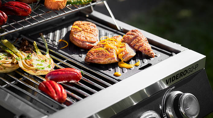 Grilled food on gas grill