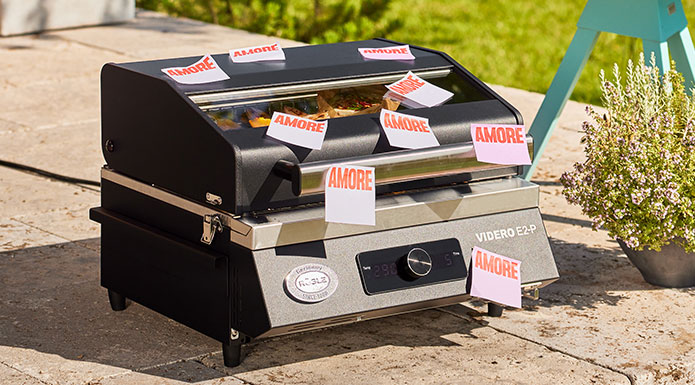 Electric grill is covered with many AMORE stickers