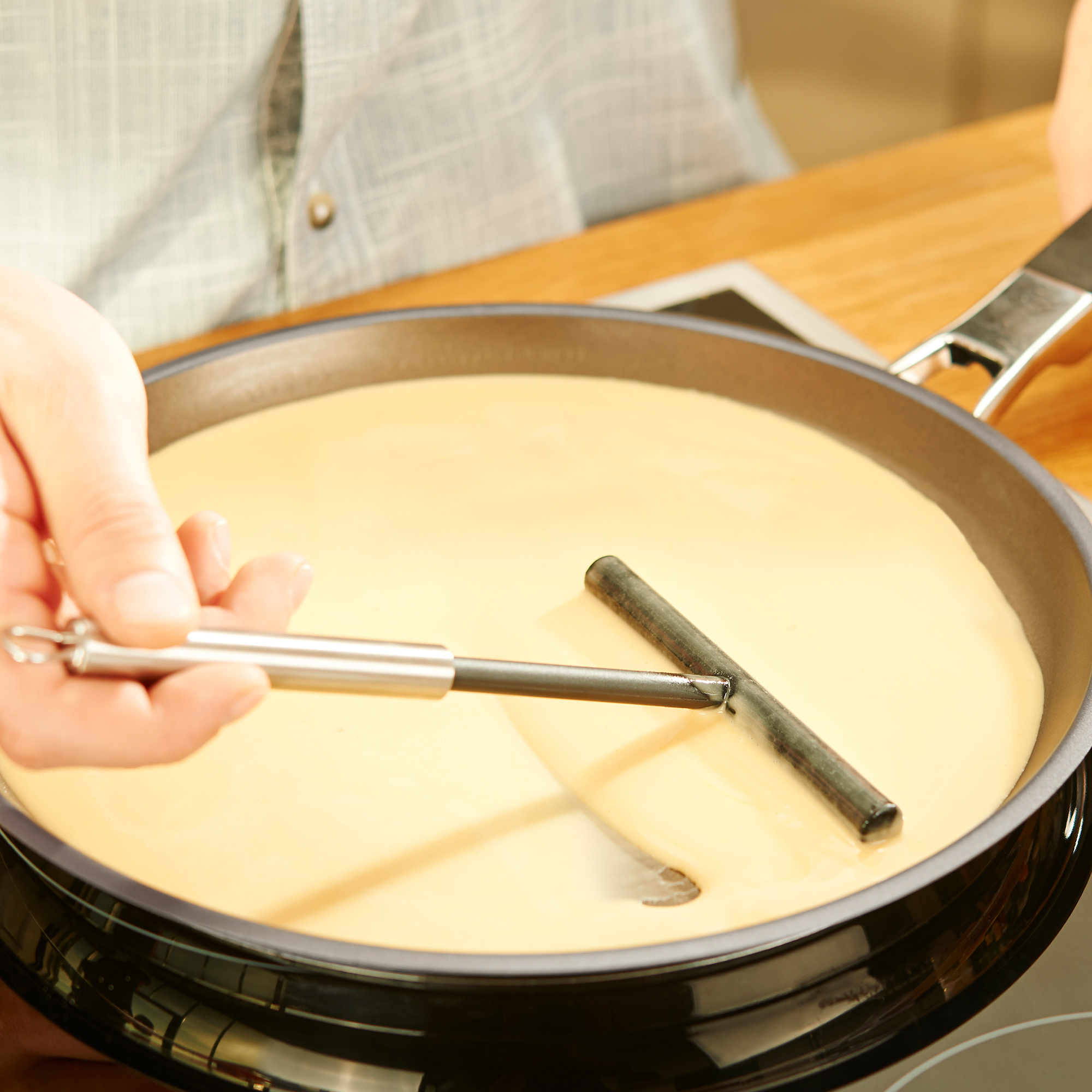 RÖSLE silicone crepe spreader Crepes spreader made of silicone in action, is used to spread batter evenly in a pan.