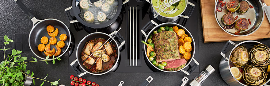 SILENCE PRO cookware series SILENCE PRO cookware series with kitchen utensils and food