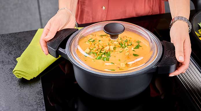 Vegetable soup in saucepan Cadini with glass lid