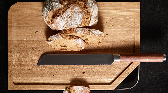 Masterclass series bread knife on cutting board
