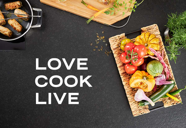 Love cook live logo next to vegetables