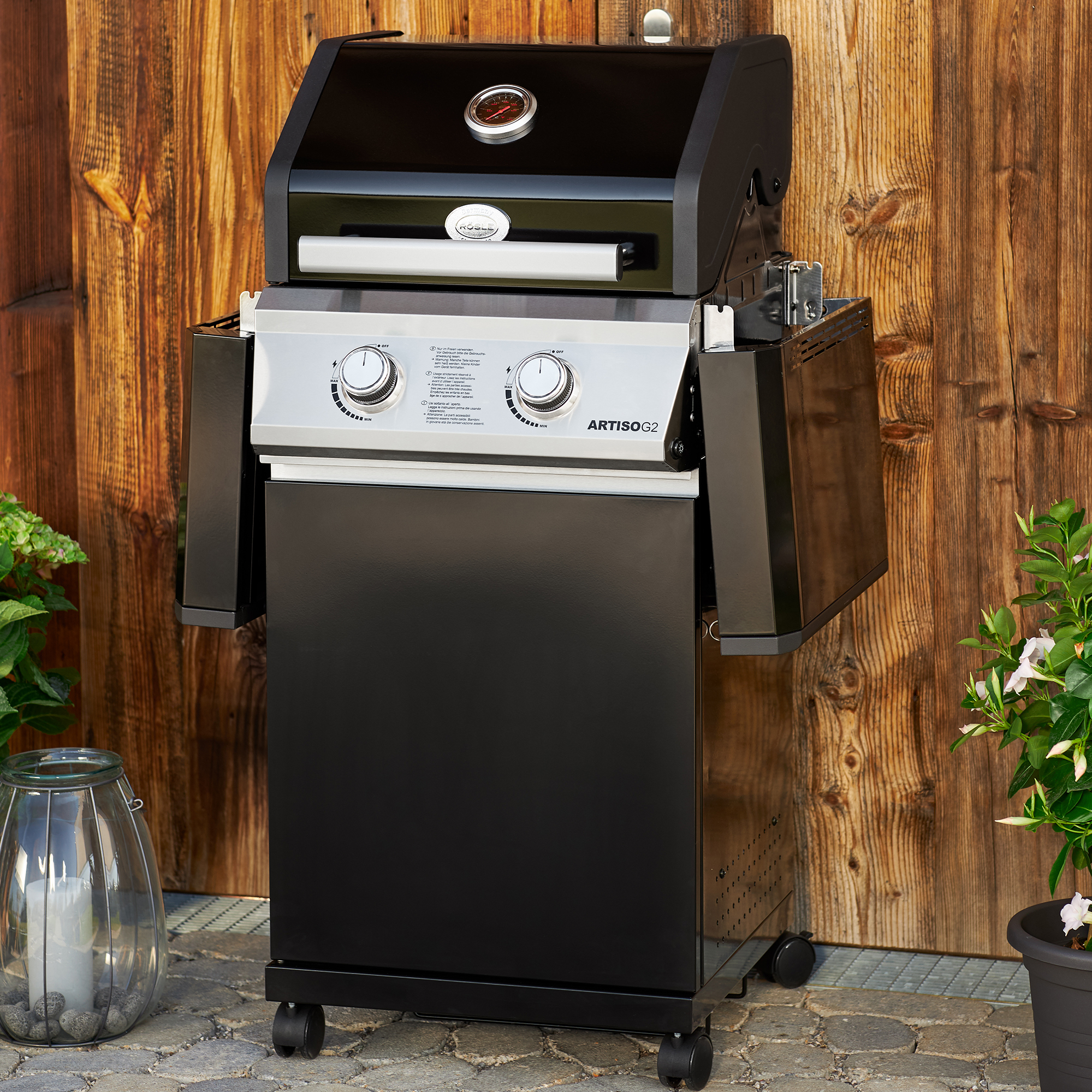 RÖSLE Gasgrill ARTISO G2 Gasgrill ARTISO G2 in Schwarz mit zwei Brennern, Temperaturanzeige und seitlichen Ablageflächen.