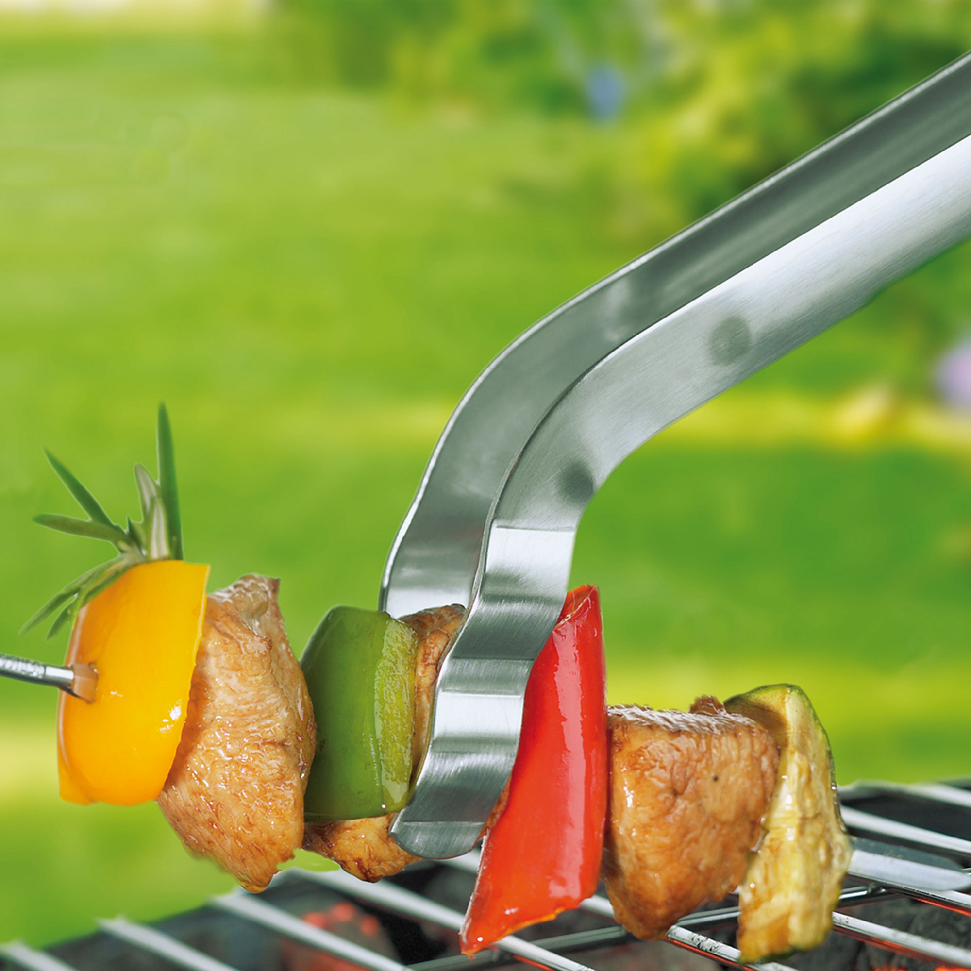 RÖSLE curved barbecue tongs Barbecue tongs, curved, made of stainless steel, grips barbecue skewers with vegetables and...