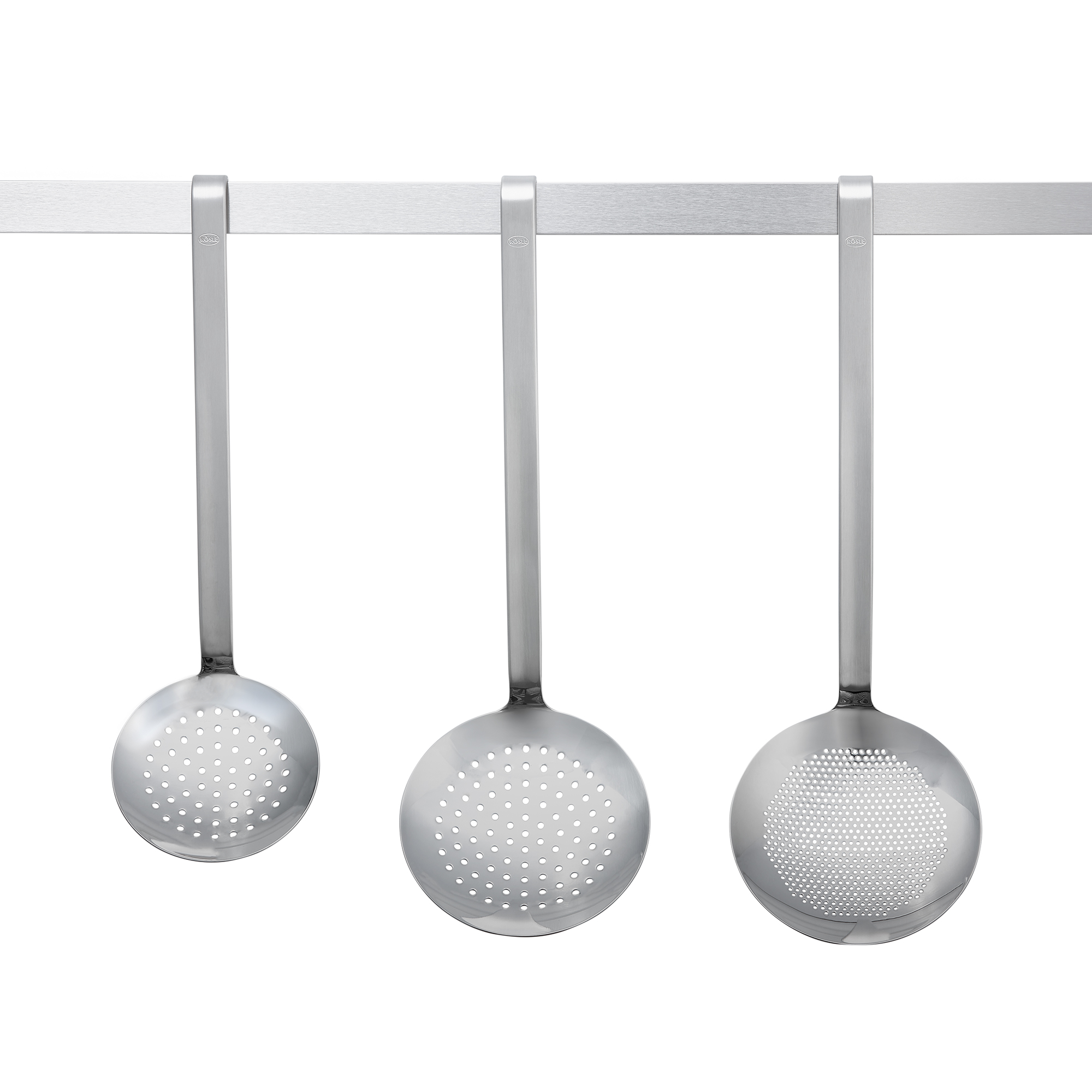 RÖSLE stainless steel slotted spoon Stainless steel slotted spoon in three sizes, with perforated bowls for straining food.