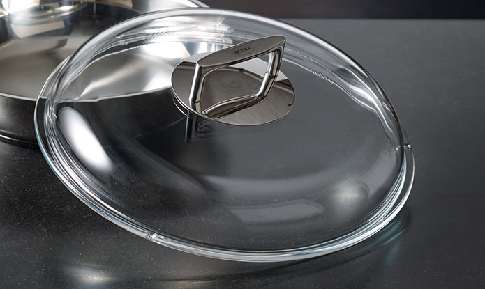 Borosilicate lid leaning against pan