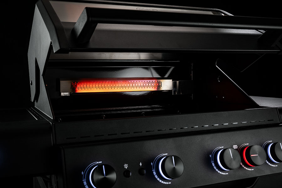 Backburner Ansicht glühender Backburner im Grill Allflame